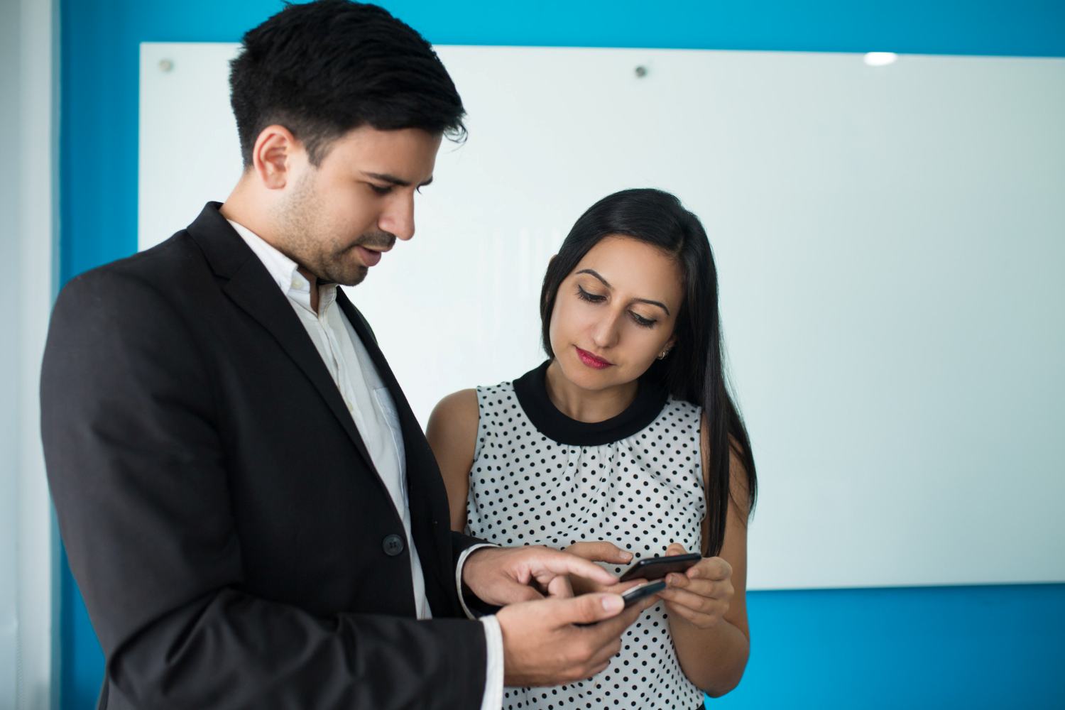 agent watching a training reel on mobile phone