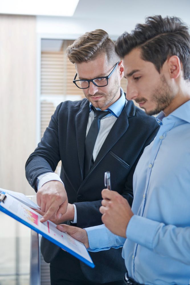 compliance manager reviewing state licence records