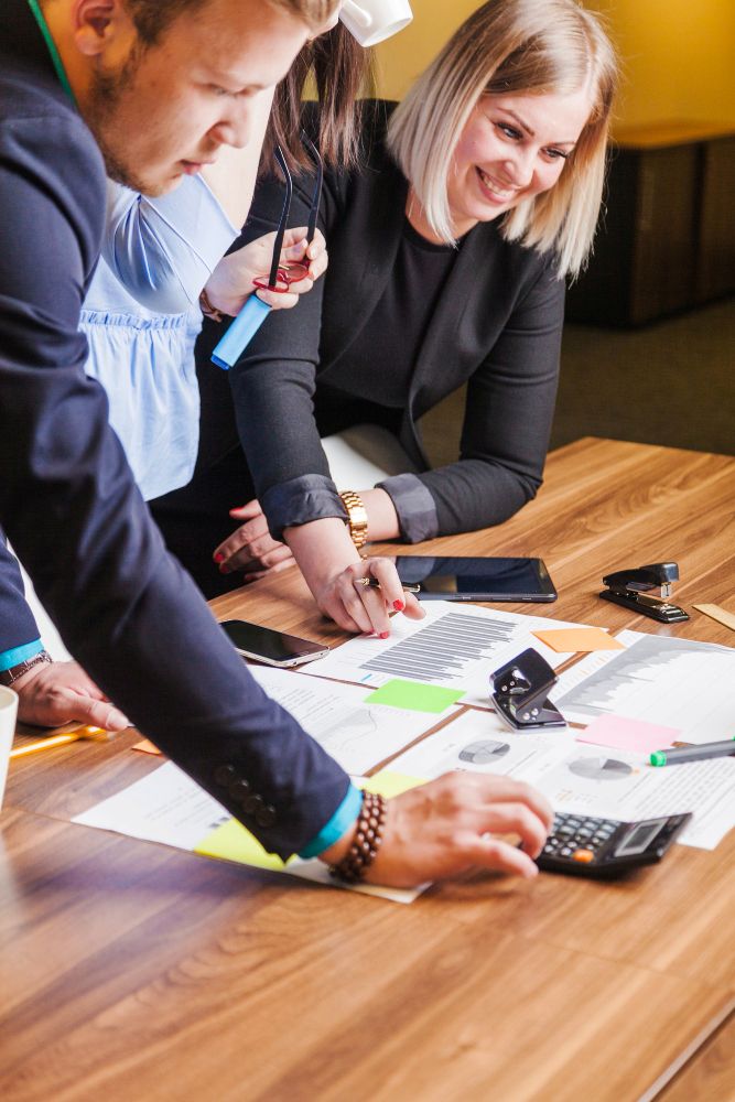 seasonal staff and managers collaborating during tax season